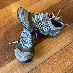 Lightly used New Balance vibram sole shoes size 7 various grey and red stitch